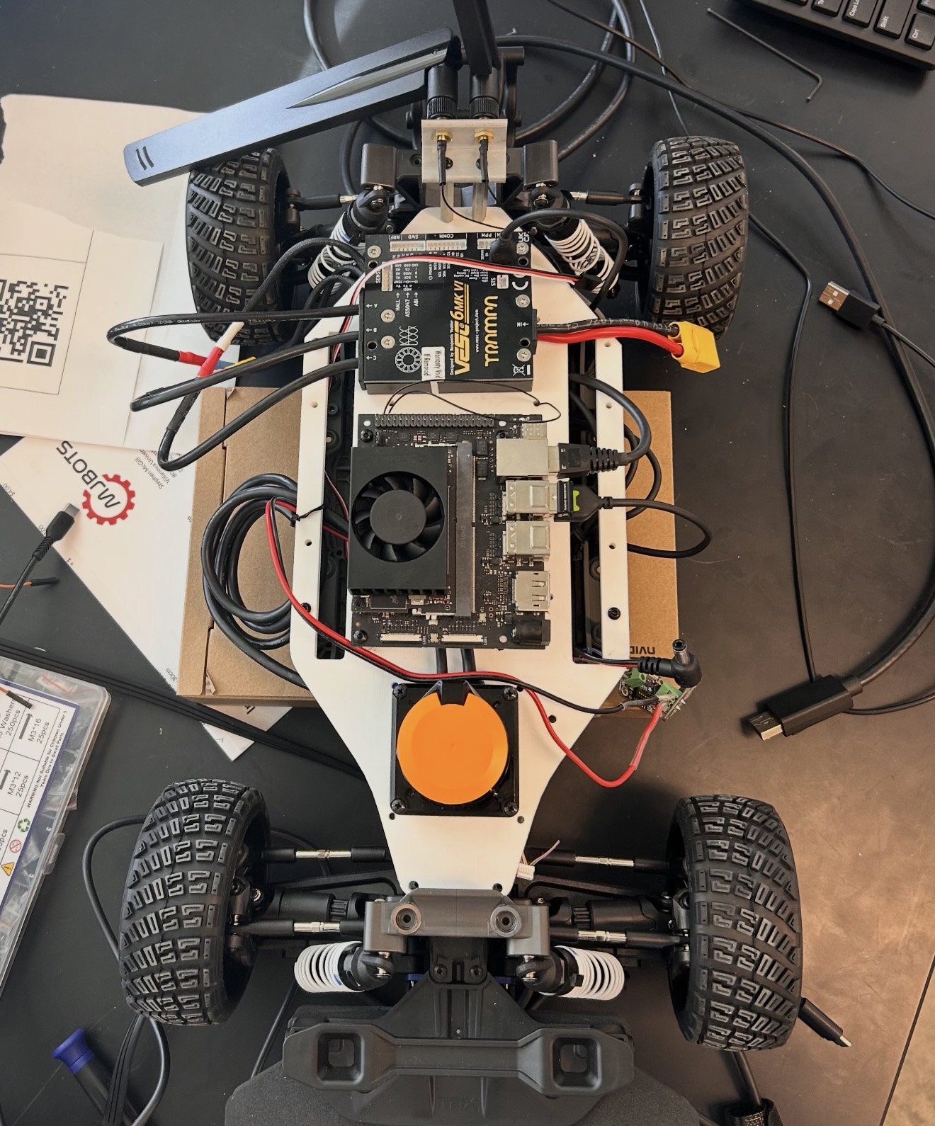 Top view showing the F1/10 research vehicle's electronics and wiring